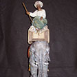 Servant on elephant, painted and decorated with pure gold - Helmut Perathoner